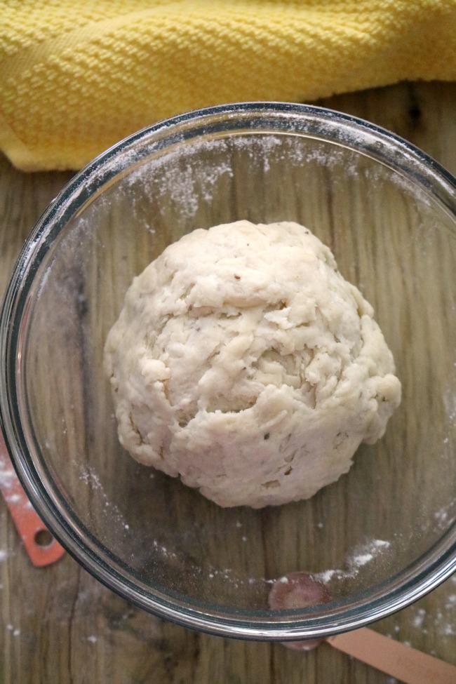 a bowl of potato samosa dough