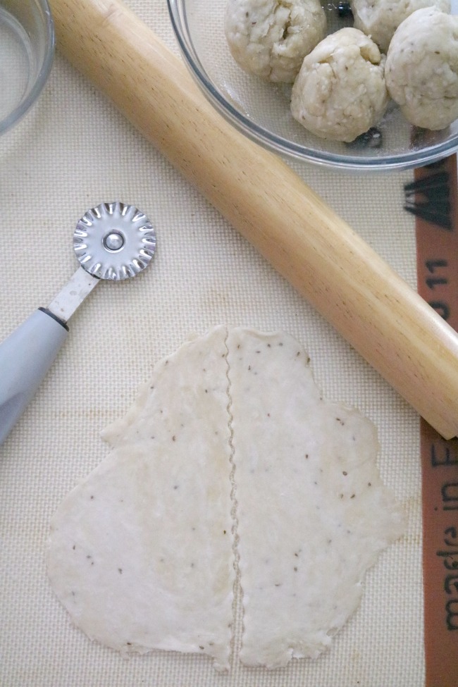 an image showing how to roll and cut the dough for potato samosas.
